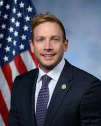 Official portrait of Max Miller